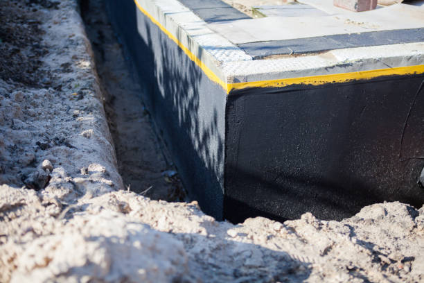 Professional Waterproofing technician working in Lansdowne, MD